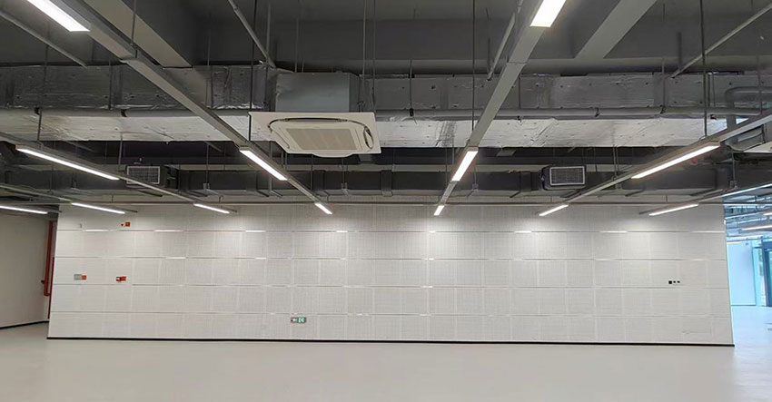Composite structure of perforated wood panel and glass wool backing